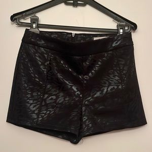 Black leopard print shorts